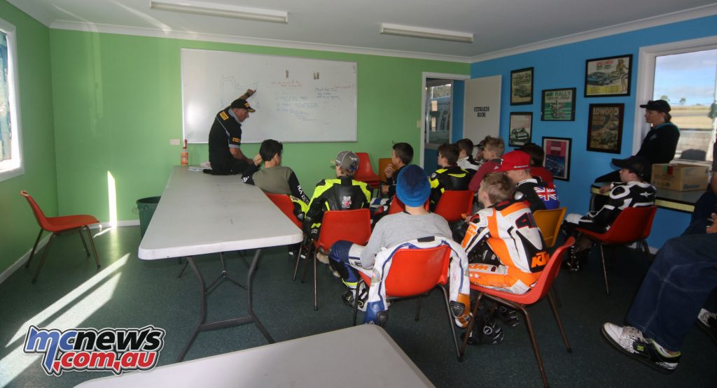 Discussing Morgan Park Raceway in detail in the classroom