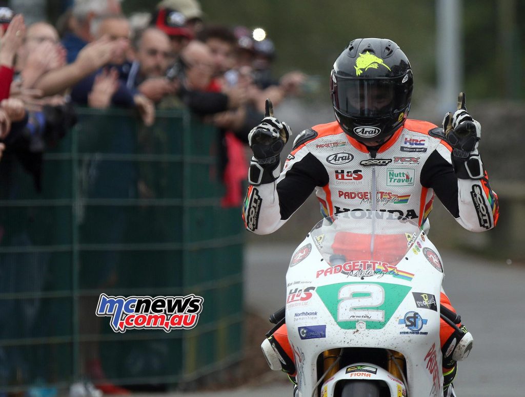 Bruce Anstey celebrates his win, and his new 250 TT Course lap record, at the end of the Dunlop Lightweight Classic TT Race. Photo Stephen Davison / Pacemaker Press Intl