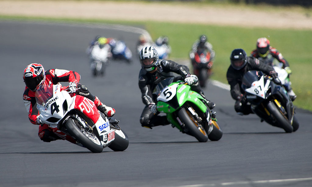 Sloan Frost leading Nick Cole and Scott Moir at Hampton Downs during the Suzuki Series in December. Photo: Andrew Bright