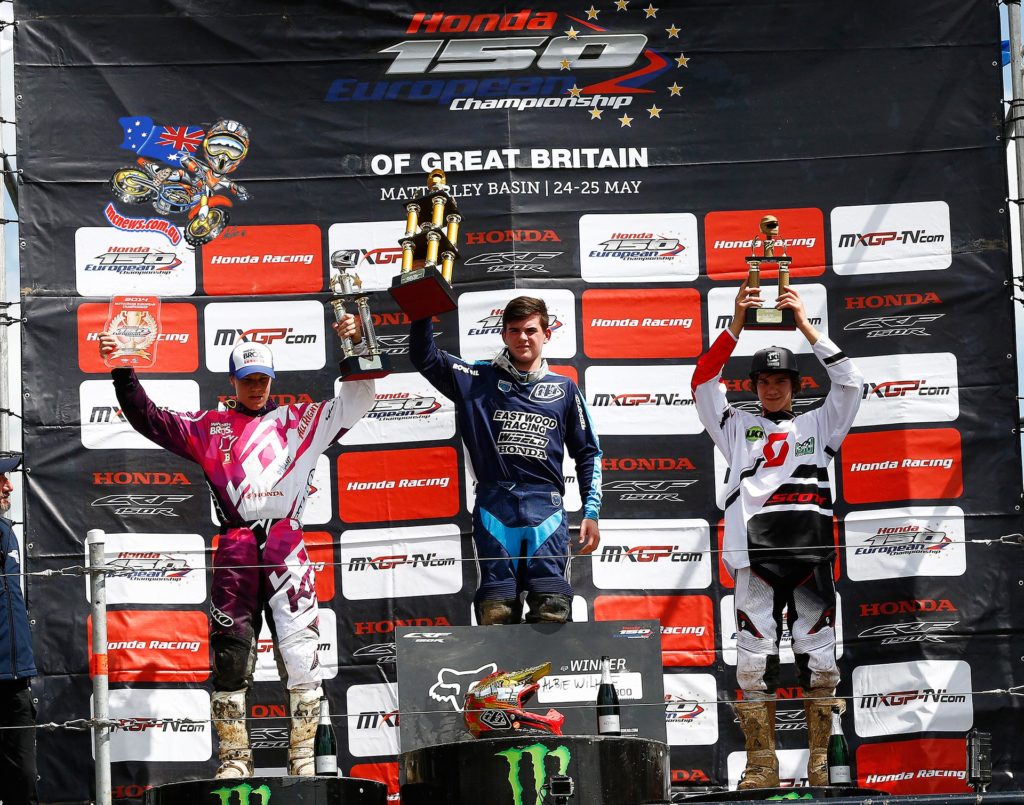 Local favourite Albie Wilkie made it back-to-back wins after taking the flag in a thrilling second race at Matterley Basin to take the overall victory at the British GP.  Wilkie won a race-long battle with red plate holder Jere Haavisto in much improved conditions on Sunday by just 0.4 seconds, making the decisive pass with just three corners to go.  Australian wildcard Hugh McKay won his own personal duel with Swede Albin Larsen to secure his place on the podium.