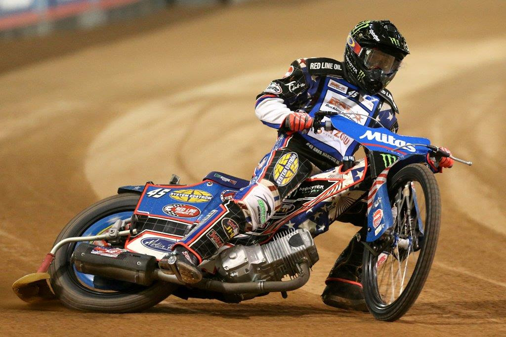 Greg Hancock’s left hand was dragged under Niels-Kristian Iversen’s rear mudguard, breaking his index finger and leaving the middle one dislocated. Tyre burns added further to his pain.