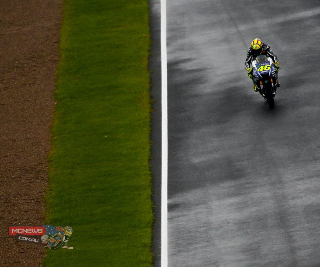 Valentino Rossi was one of only eleven riders who braved the rainy weather at a soaking wet Ricardo Tormo Circuit. The Italian sensibly decided to wait for conditions to get better before mounting his 2014 Yamaha M1, saving the 2015 bike for dry conditions.