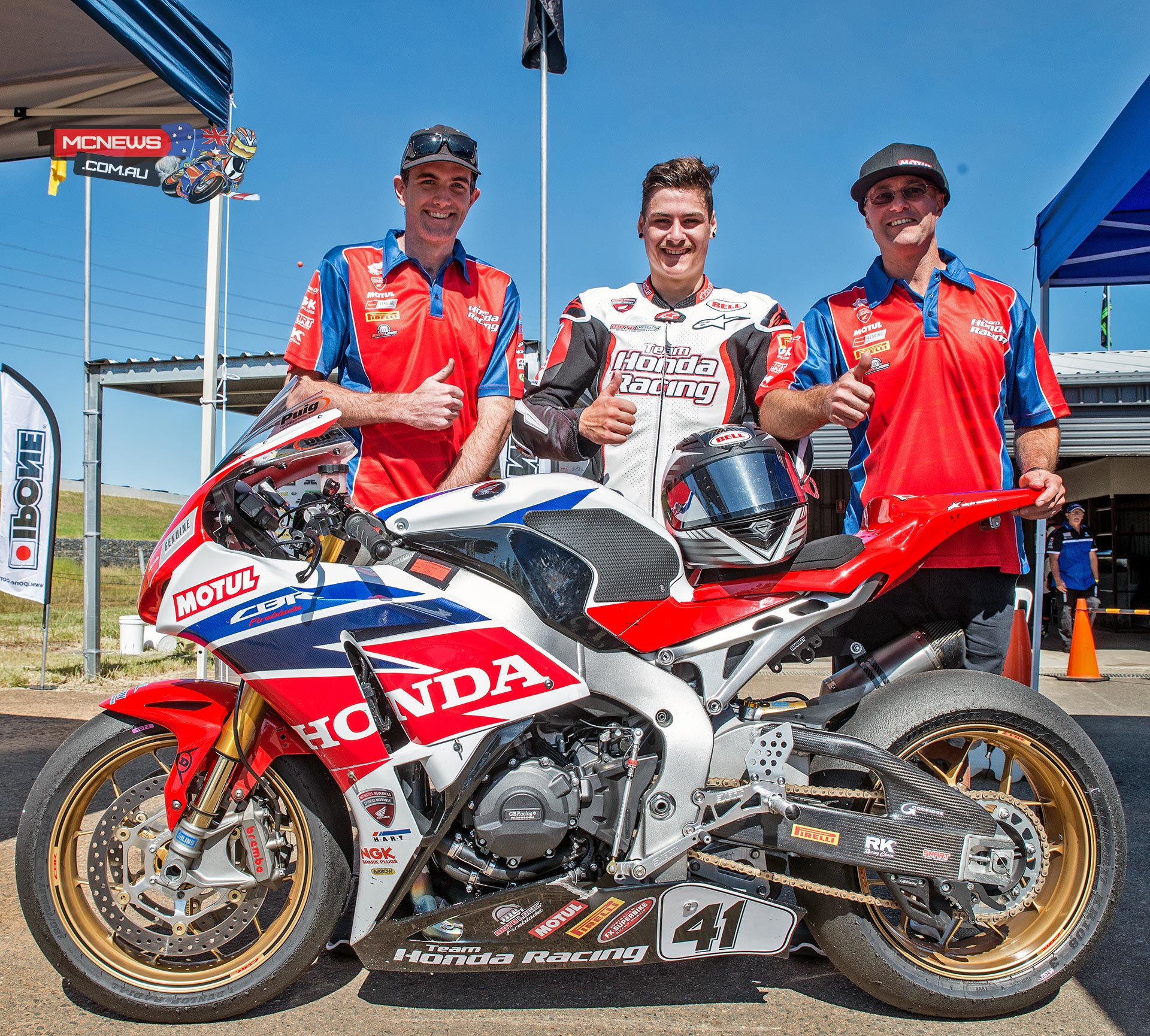 Aiden Wagner with mechanic Dan Williams and Team Honda boss Paul Free after taking out race one on his Superbike debut at Sydney Motorsports Park earlier this year. Wagner was offered a ride with Team Honda for the remainder of 2015 but elected to go overseas