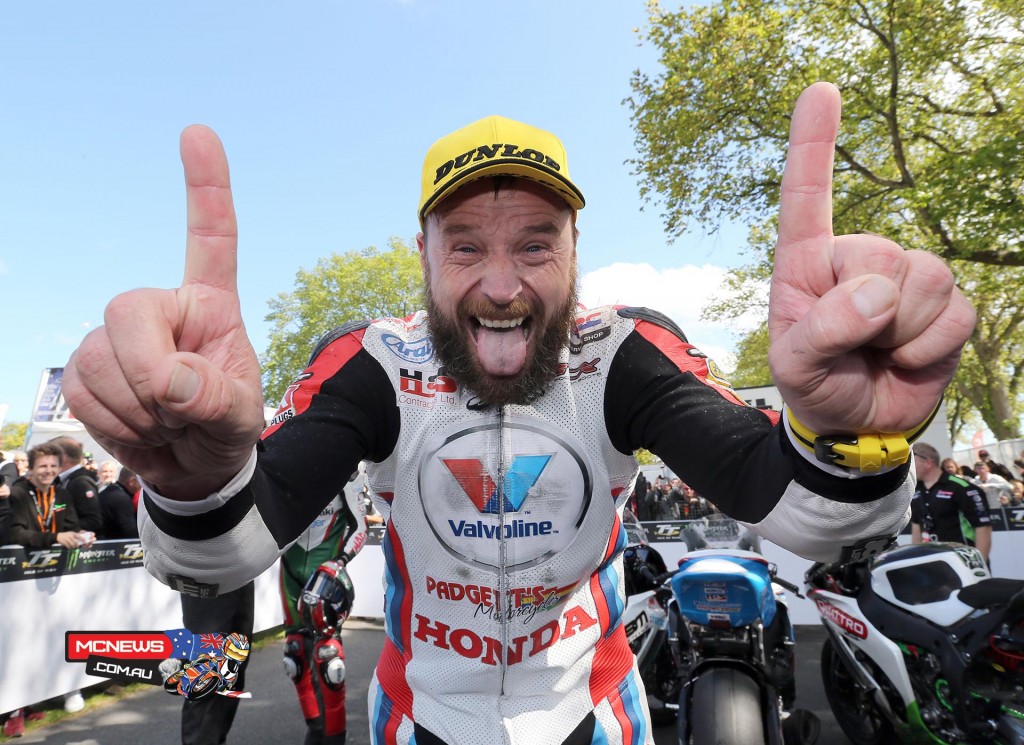 A happy Bruce Anstey celebrates his win in the RST Superbike Race