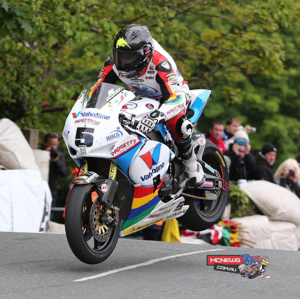 Isle of Man TT fuelled by Monster Energy RST Superbike race winner Bruce Anstey jumps Ballaugh Bridge