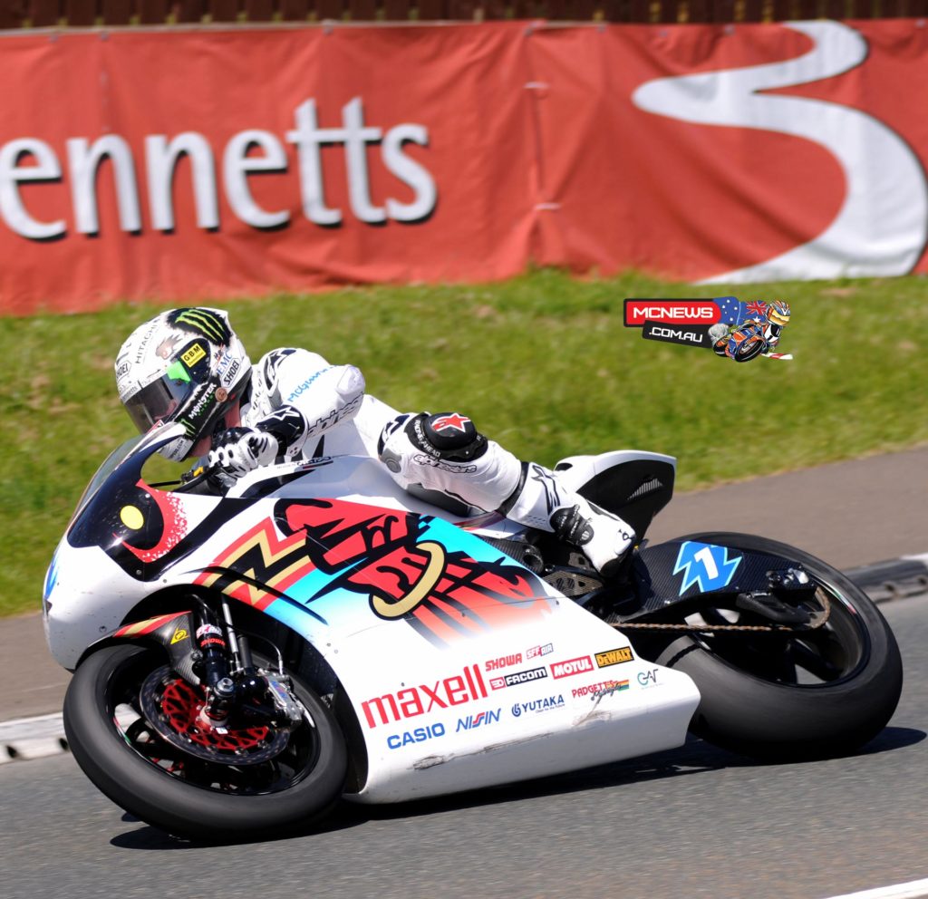 John McGuinness pushes the Mugen entry to a 119.279mph lap in the 2015 SES TT Zero challenge. Credit Pacemaker Press Intl.