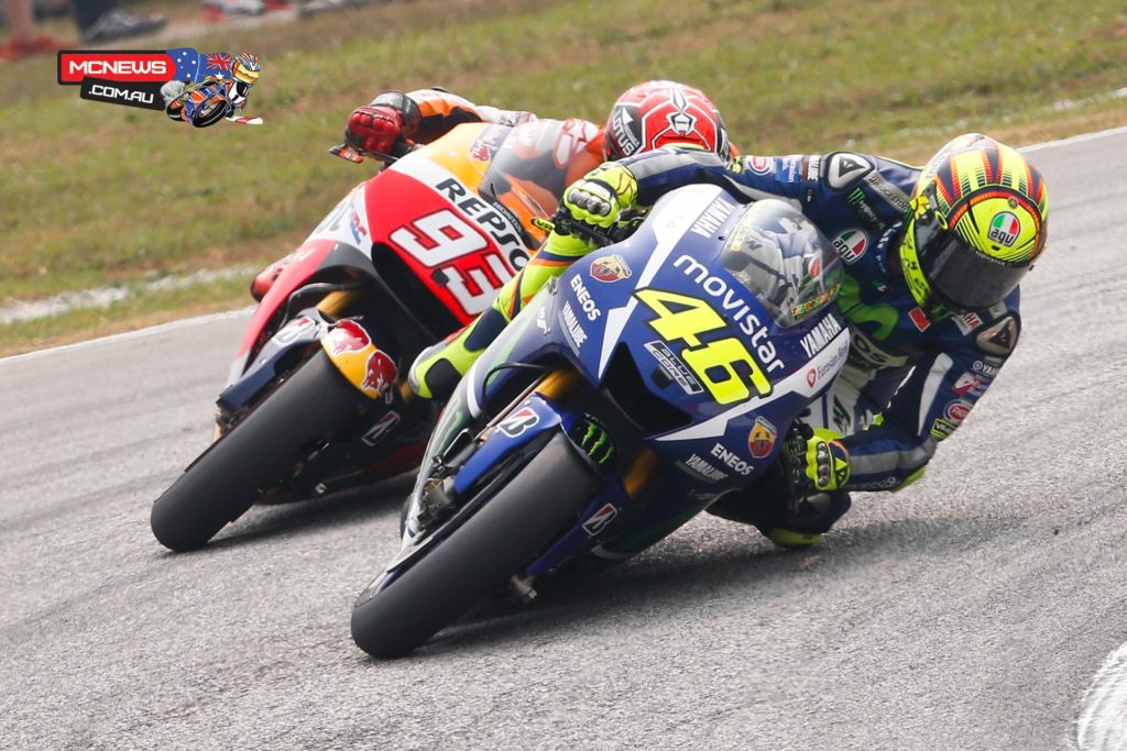 Valentino Rossi and Marc Marquez tussle at Sepang MotoGP 2015