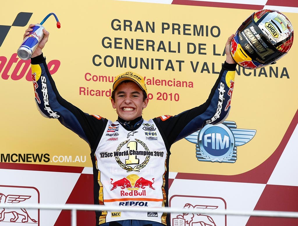 Marc Marquez celebrates winning the 2010 Moto3 Championship at Valencia MotoGP 2010