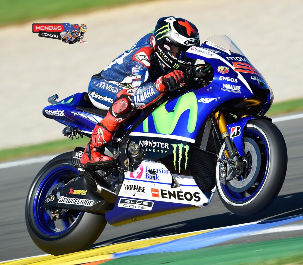 Jorge Lorenzo smashed the lap record on his way to pole ahead of Marquez and Pedrosa, as Rossi crashes and finishes Q2 in 12th.