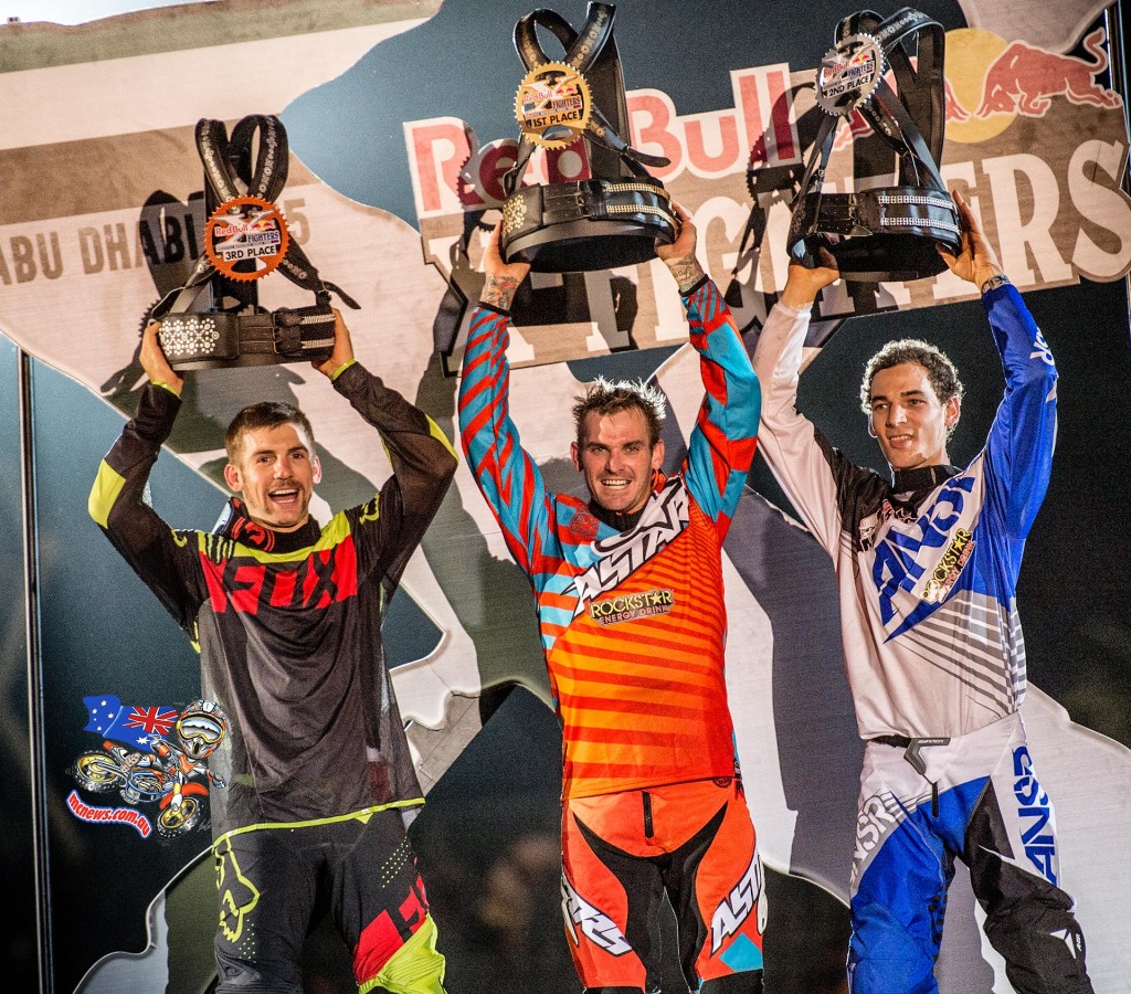 Josh Sheehan of Australia, Clinton Moore of Australia, Rob Adelberg of Australia celebrate at the final stage of the Red Bull X-Fighters World Tour in Abu Dhabi, United Arab Emirates on October 30, 2015.