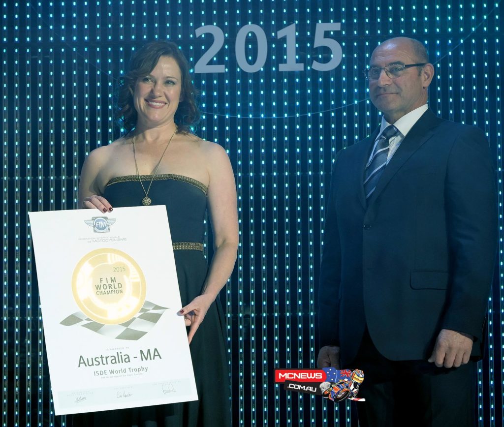 MA President Tania Lawrence accepting Australia's 2015 International Six Days Enduro World Trophy Team award from FIM Enduro legend Guglielmo Andreini at the 2015 FIM Gala Ceremony (Credit: FIM/GoodShoot)