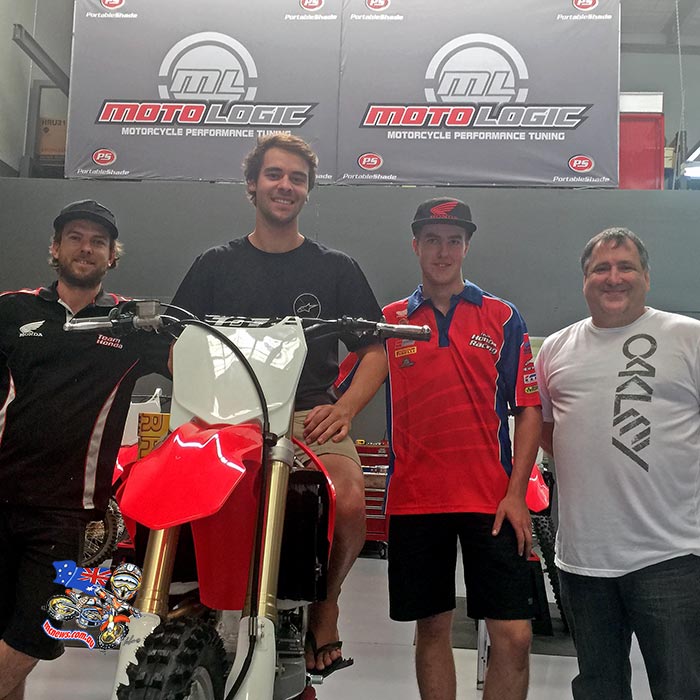 Jay Wilson trying a CRF450R on for size at Team Honda Racing with Technicians Daryl Fenn (on Jay's right), George Rawlings and Pip Harrison.