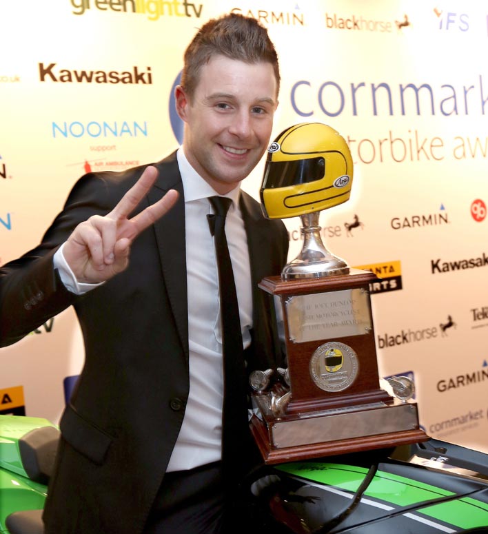 Jonathan Rea lifts Joey Dunlop Trophy aloft after being named Irish Motorcyclist of the Year