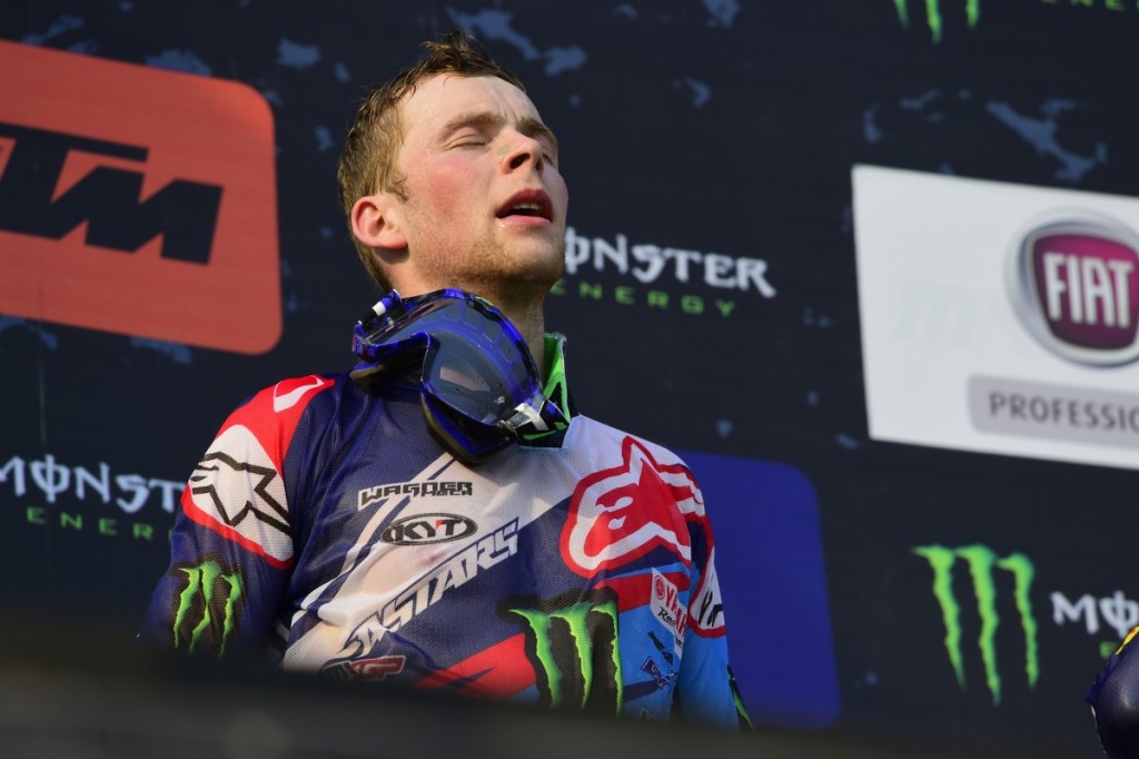 An exhausted Febvre on top of the podium in Holland