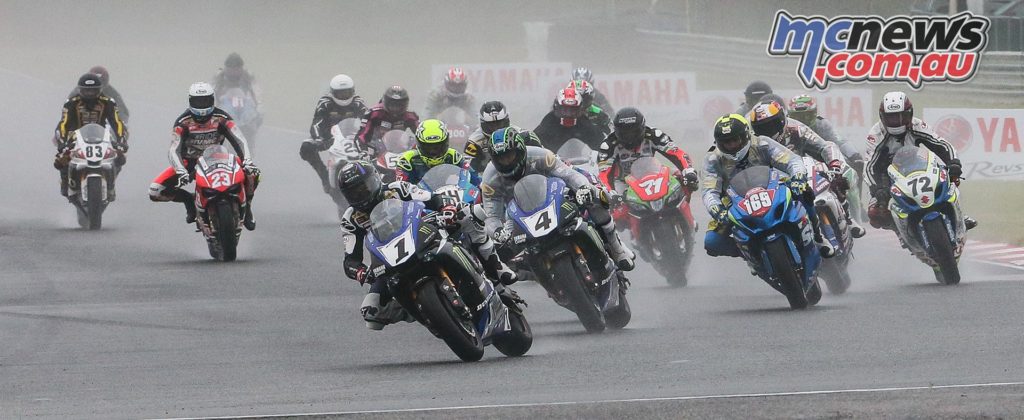 Cameron Beaubier (1) leads Josh Hayes (4), Hayden Gillim (169) and the rest of the Superbike pack in race two at NJMP. Photo by Brian J. Nelson.
