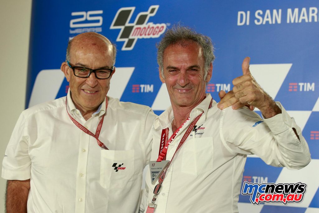 Franco Uncini receives his MotoGP Legend medal from Carmelo Ezpeleta