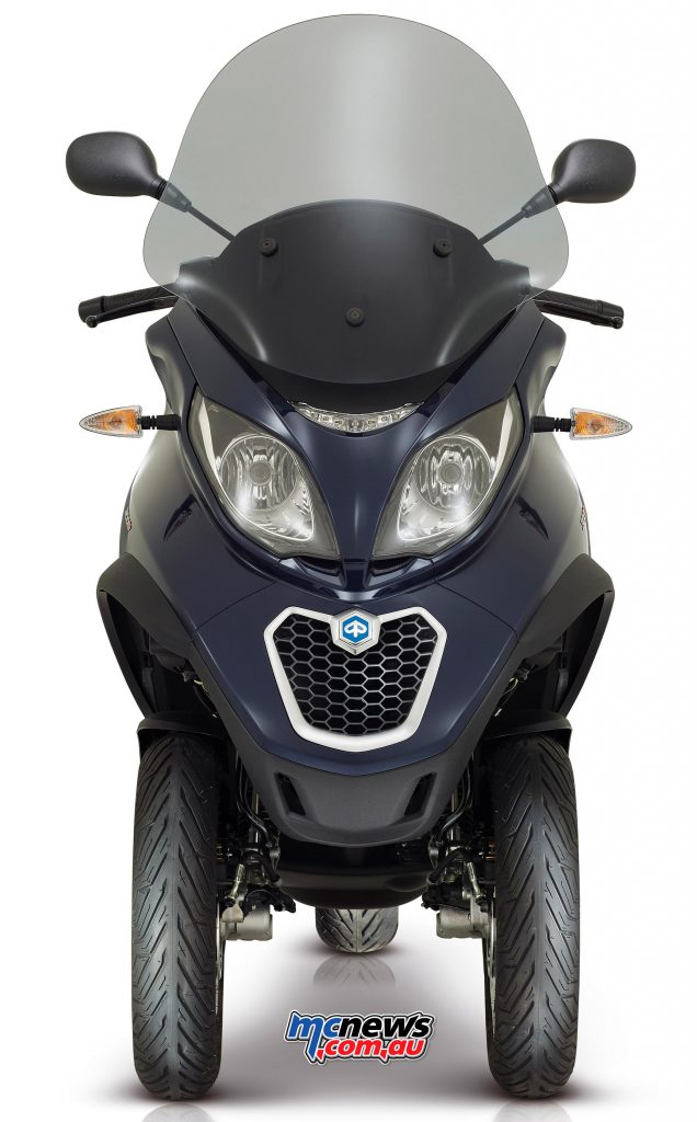 Piaggio MP3 300 Business. The headlight now includes LED daytime running lights and indicators are LED items.