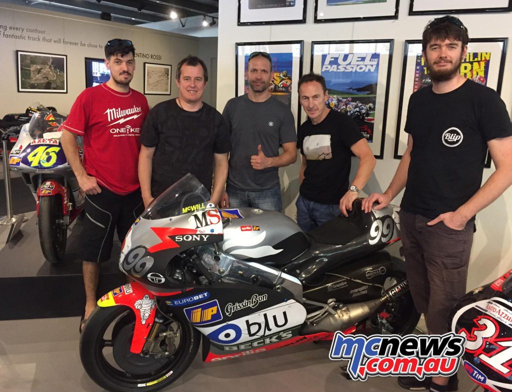 Jeremy McWilliams, James Hillier, Conor Cummins, Glen Richards and John McGuinness check out the McWilliams Aprilia RSV500 that he took pole position on at Phillip Island