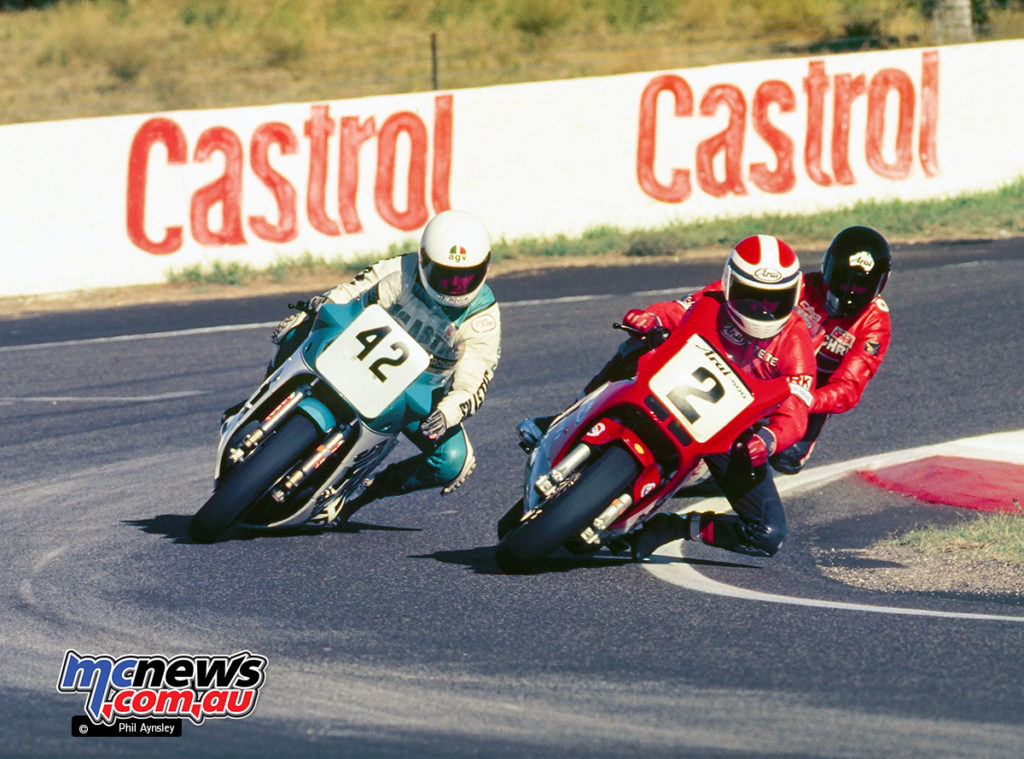Bathurst 1986 - Pete Byers/Frasers Ducati 750 Montjuic and Chris Oldfield/Gowanloch Bimota DB1 slip under Barry Thompson/Yamaha 750 at Murrays Corner