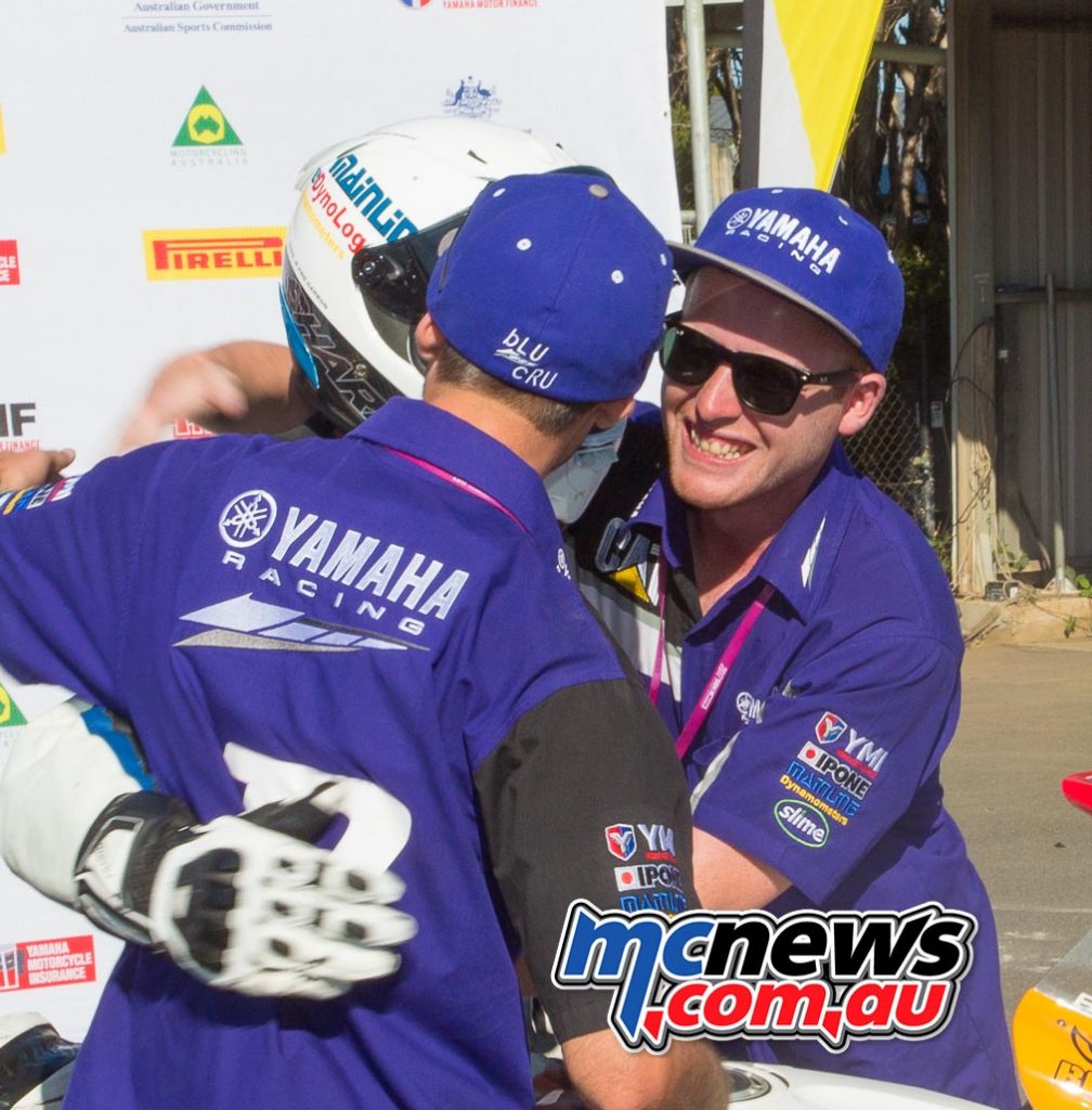 Daniel Falzon congratuled by brother Jon, his electronics guru, and good friend Liam Wilkinson in Parc Ferme after wrapping up a perfect result at the Phillip Island ASBK season opener - Image by Cameron White