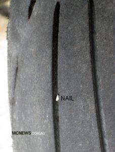 Riding Around Australia - Tyre puncture