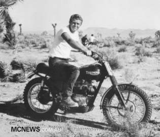 Steve McQueen on one of his many Triumph motorcycles
