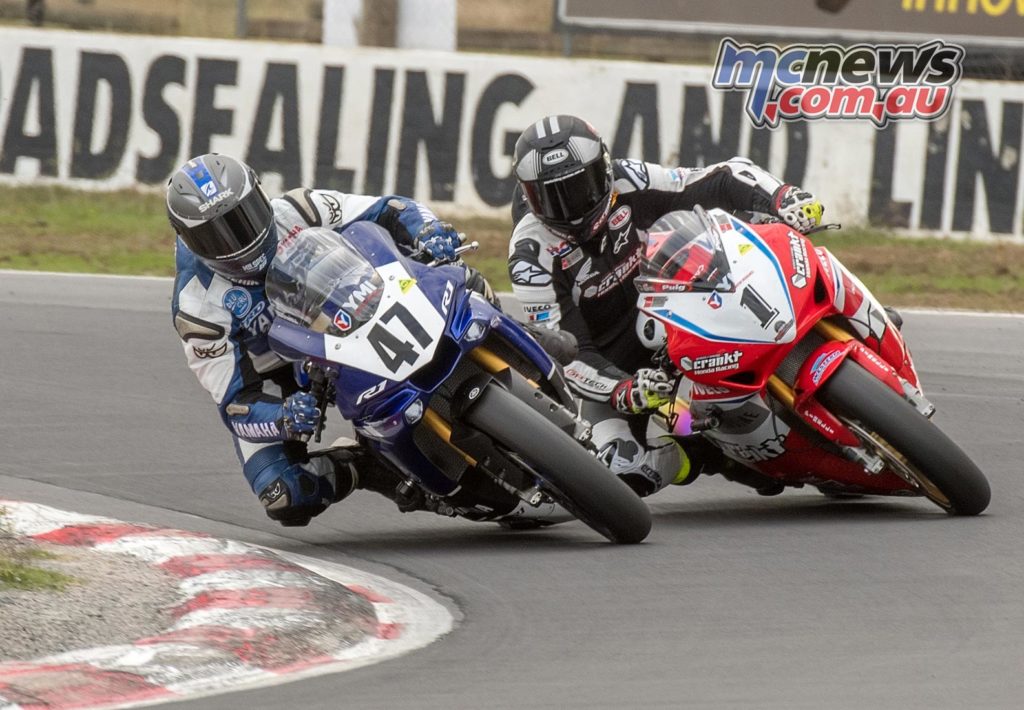 Wayne Maxwell passes Troy Herfoss for the lead at Winton Motor Raceway today - Image by Half Light Photographic
