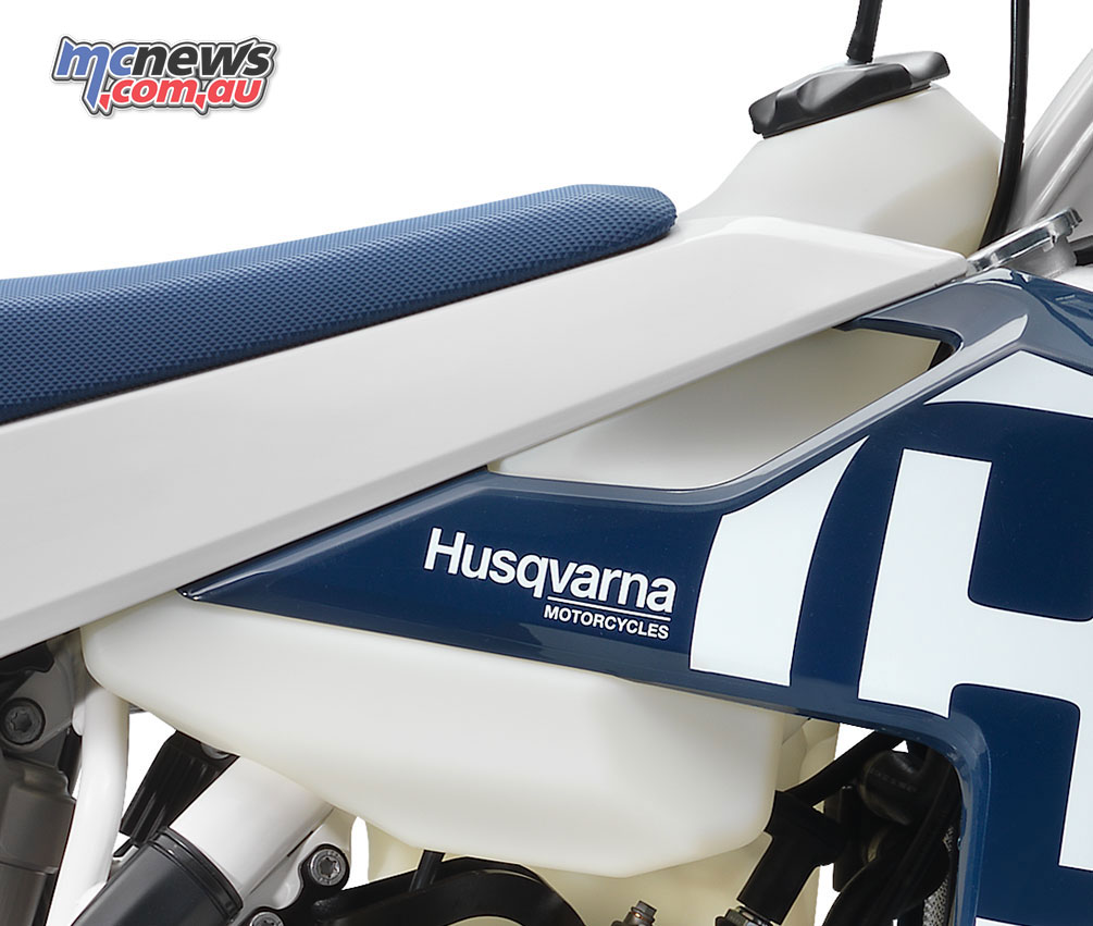 The Husqvarna two-stroke fuel tank, with translucent plastic for easy fuel level checking
