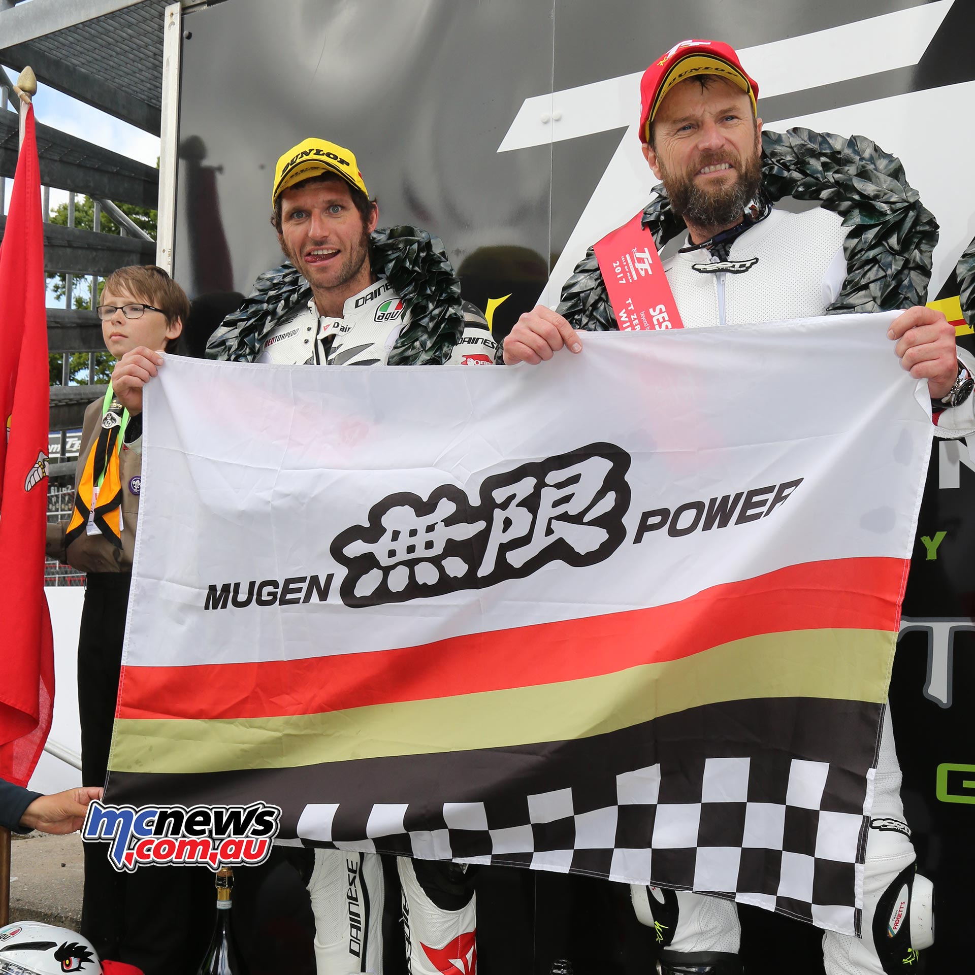 IOMTT-2017-Zero-Bruce-Anstey-Guy-Martin-Mugen-Flag Bruce Anstey and Guy Martin flying the Mugden flag after their victory