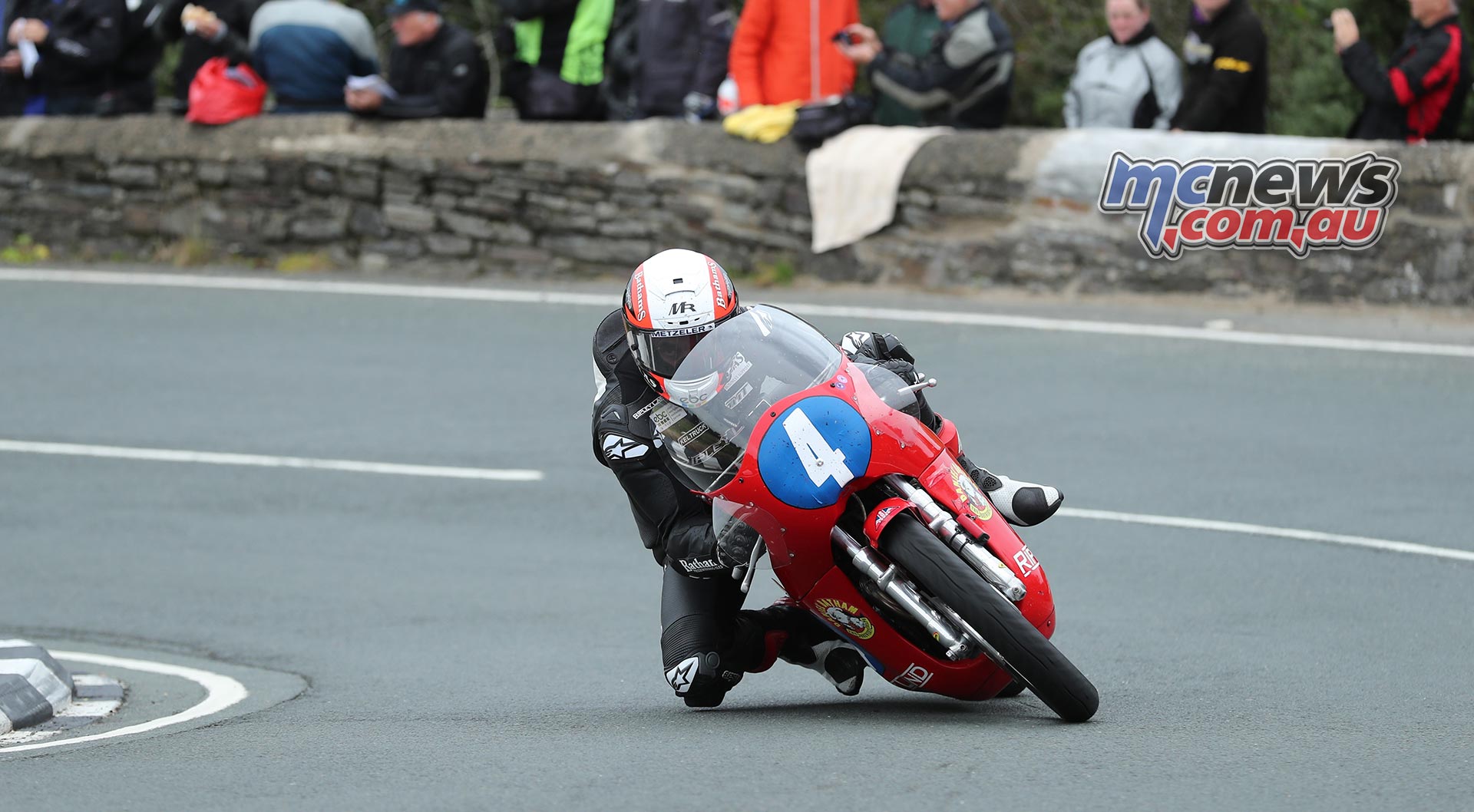 Michael Rutter at the Gooseneck on his way to winning the Sure Junior Classic TT Race. Photo Dave Kneen