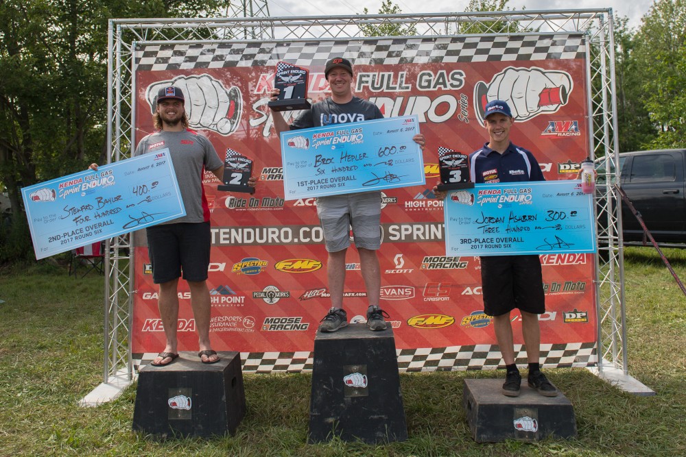 Steward Baylor, Broc Hepler and Jordan Ashburn celebrate Fairmount podium