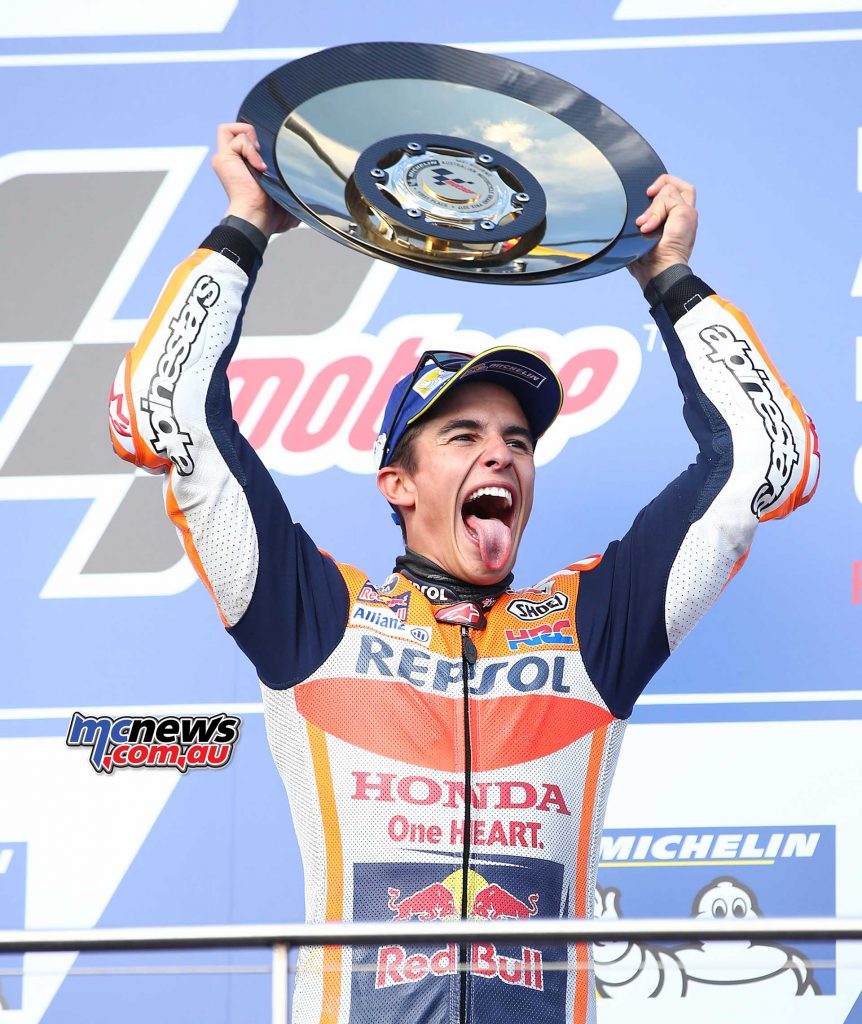 Marc Marquez pokes his tongue out at the retards booing him on the podium at Phillip Island - Image by AJRN