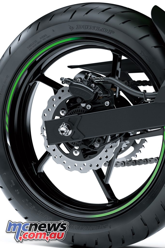 The front brake is a 310mm with two-piston caliper, while the rear is a 220mm item