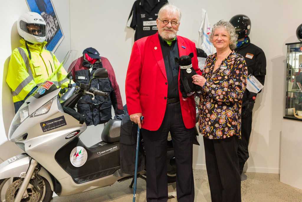 Bertrand regretfully hands over the Honda SilverWing to the director of the East Coast Heritage Museum. The scooter has 65,000km on the clock. Image by Martin, Madhouse Photography