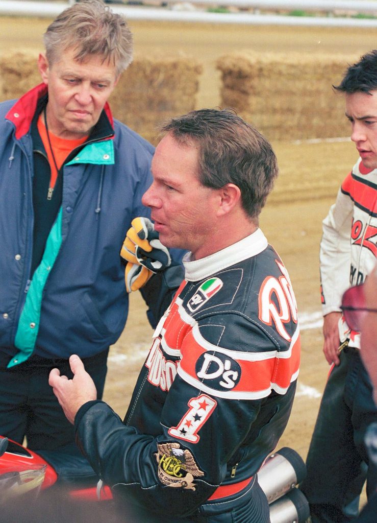 Bill Werner in consult with his rider Scott Parker at the Du Quoin Mile Photo Dave Hoenig