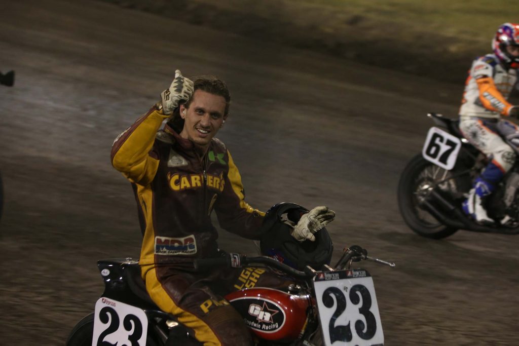 Excitedly taking the checkered flag Carver proudly takes the victory lap on his XR Photo Scott Hunter Excitedly taking the checkered flag Carver proudly takes the victory lap on his XR Photo Scott Hunter