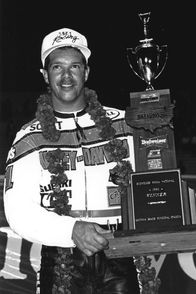 Parker collecting the hardware for one of his many victories. Parker currently holds the record for most career wins at Photo NASCAR Archives