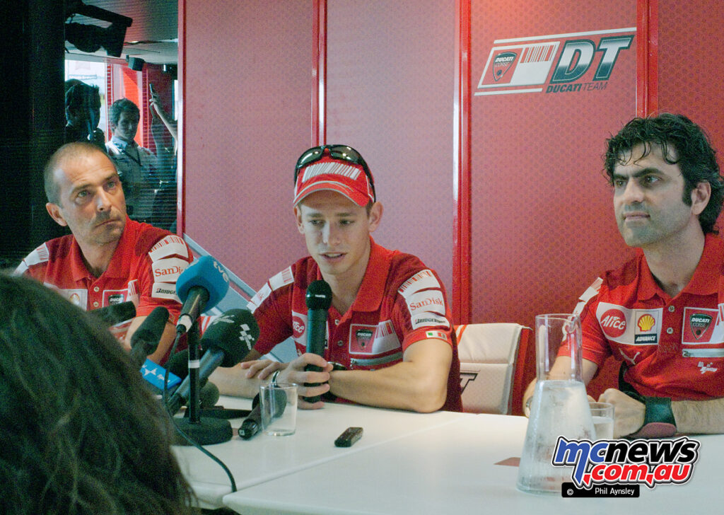 Casey Stoner flanked by Team Manager Livio Suppo (L) and General Manager Filippo Preziosi (R) give a pre race press conference to discuss his time off after illness.