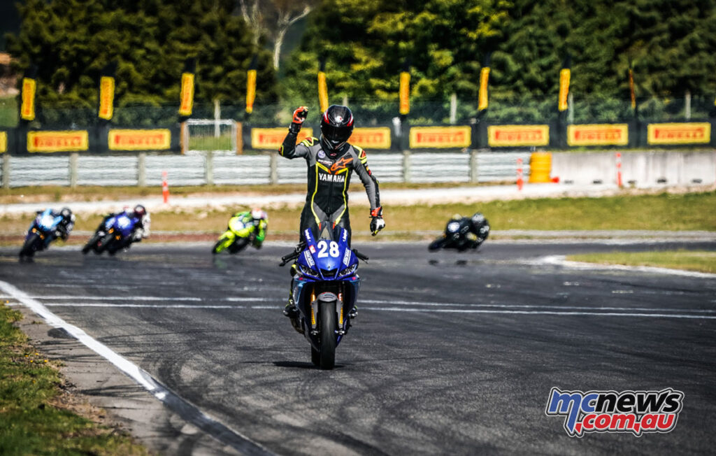 Invercargill 14-year-old Cormac Buchanan celebrates winning both the Supersport 150 and 300 class titles