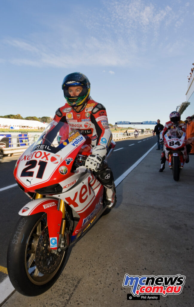 Troy Bayliss heading out for P1 Friday morning with teammate Michel Fabrizio.