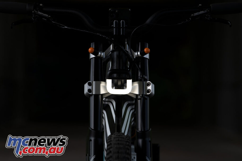 The headlight and taillight setups both resembled bicycle units, more than those on a full-functioning motorcycle