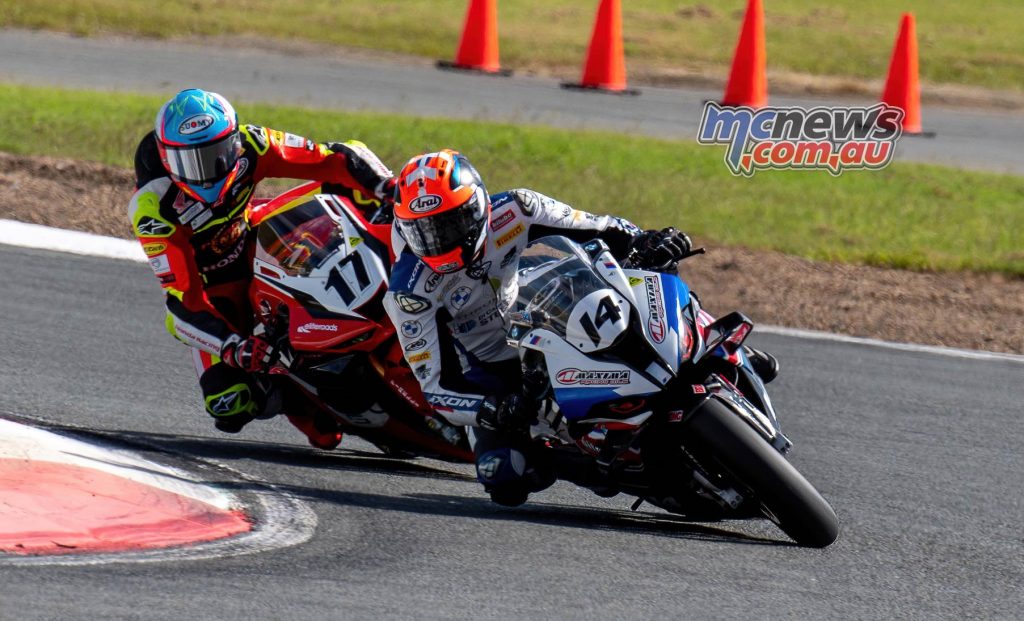 Troy Herfoss chasing Glenn Allerton in the second race in QLD - Image RbMotoLens