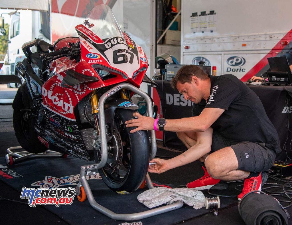 Ben Henry fettling Staring's DesmoSport Ducati in Darwin - Image RbMotoLens