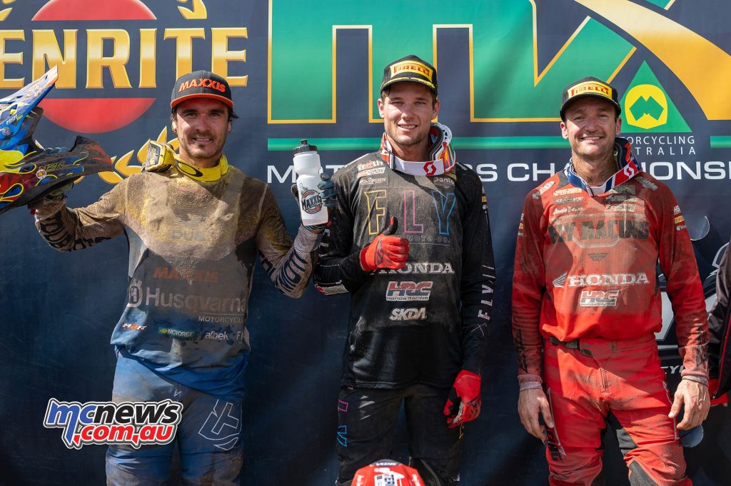 Todd Waters, seen here at the left of shot on the race one podium at Coolum, got plenty of seat time this year! Waters not only did ProMX, but also AORC (currently second in E2), Hattah (2nd), A4DE (2nd in E2 and fourth outright) and won Manjimup! Image RbMotoLens