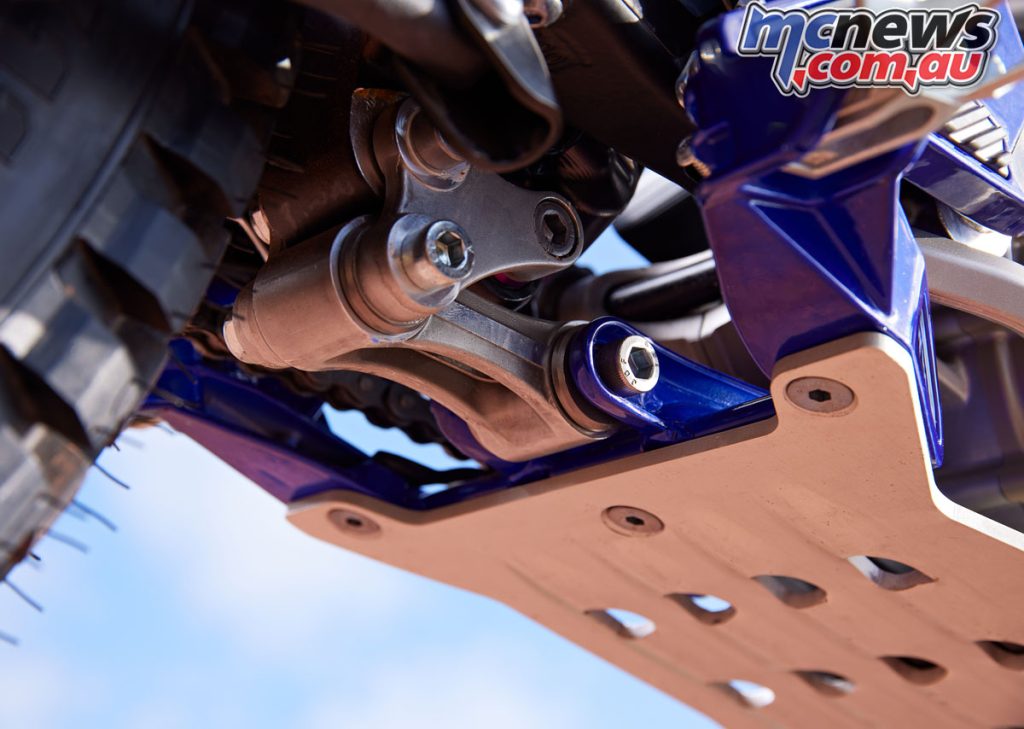 The linkage is lighter and the swingarm pivot lower