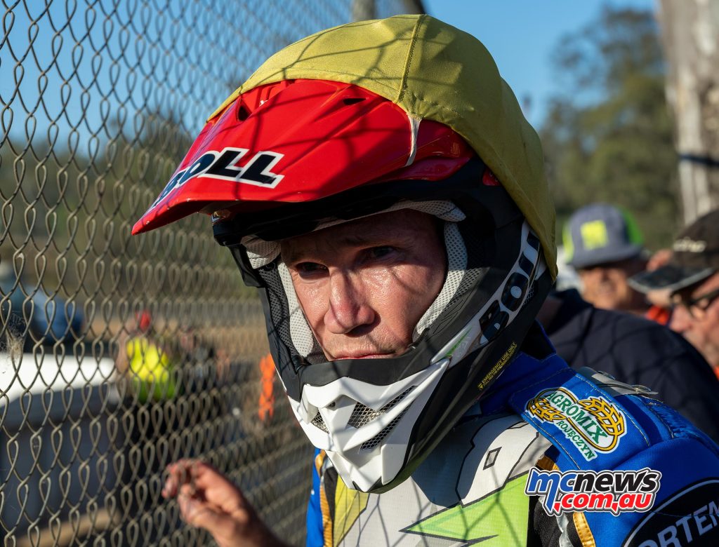 Jason Doyle examining the form of his opponents and the conditions of the tracks between heat races at Diamond Park - Image TH