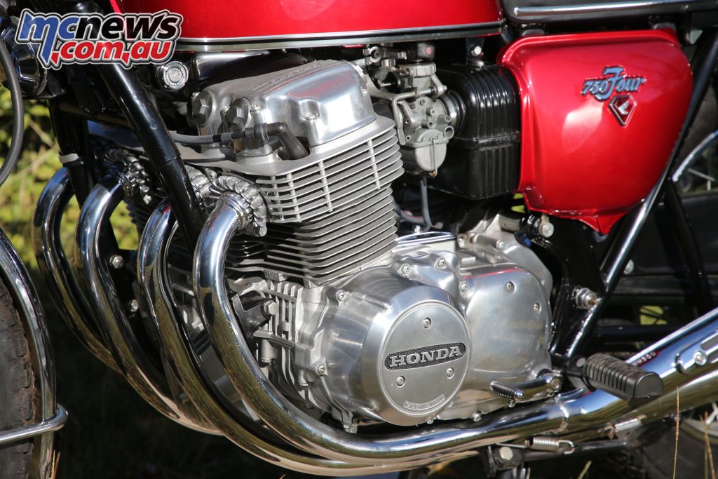 The CB750 ran a single overhead cam, four-cylinder engine but was also a heavy machine