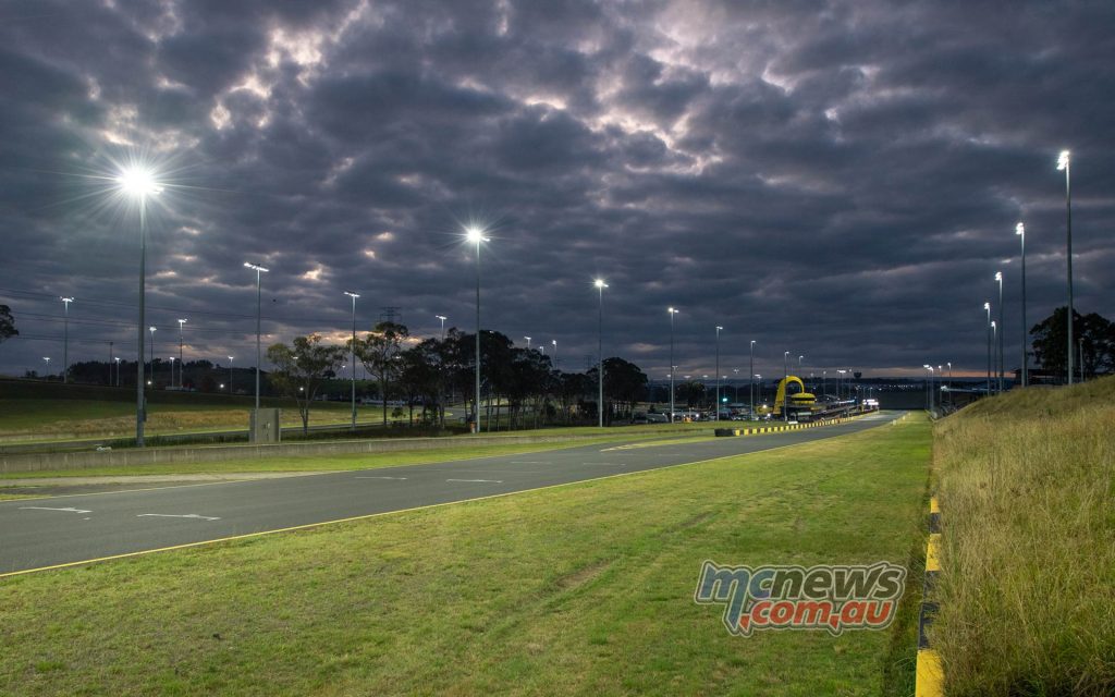 The clouds rolling over Sydney Motorsport Park at Round 4 as the lights come on