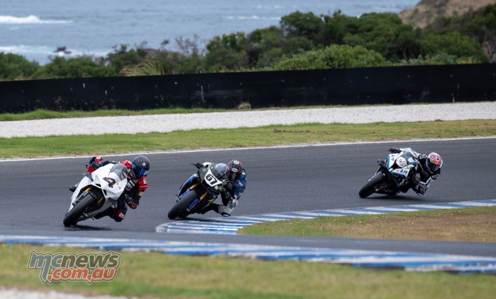 Broc Pearson leads Bryan Staring and Ted Collins in the Greg Bailey race - Image by RbMotoLens