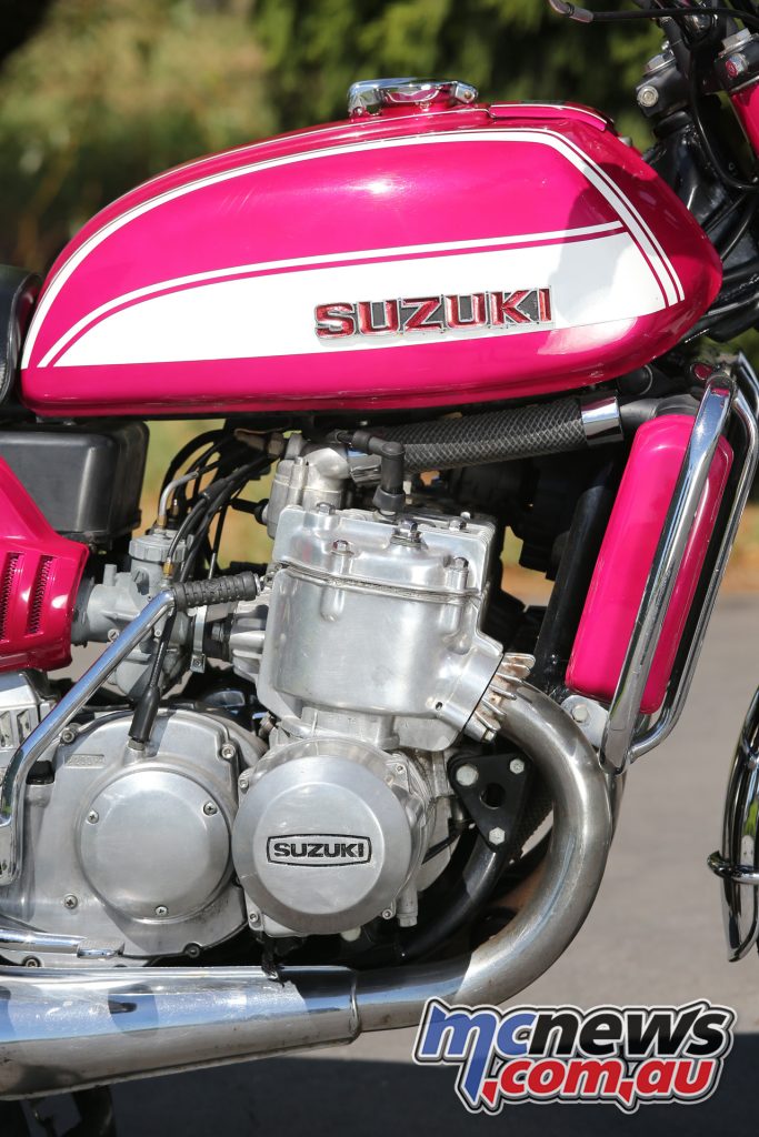 The water-cooled three-cylinder two-stroke was unique